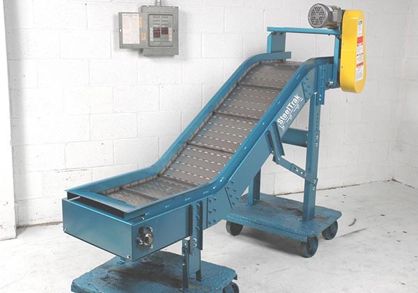 Photo of nle – steel hinge belt & heavy duty belted conveyors