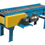 New London Engineering Model 600 belt-driven live roller conveyor with bottom-mount drive and yellow drive guard