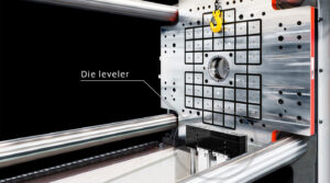 Pascal Die Leveler (MDH) 3 Pascal Die Leveler MDH mounted below a mag clamp on the fixed platen of an injection molding machine